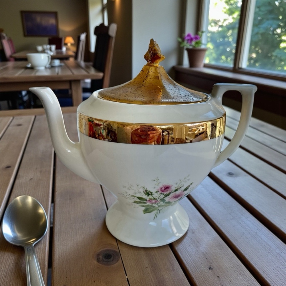 Vintage teapot,maker unknown, delicate pink rose design, small chip on inner rim